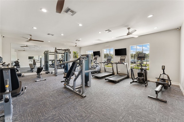 exercise room with ceiling fan and carpet floors