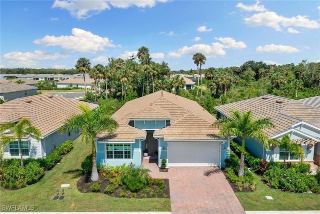 view of front of property with a garage