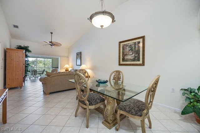 dining space featuring light tile patterned flooring, ceiling fan, visible vents, and baseboards