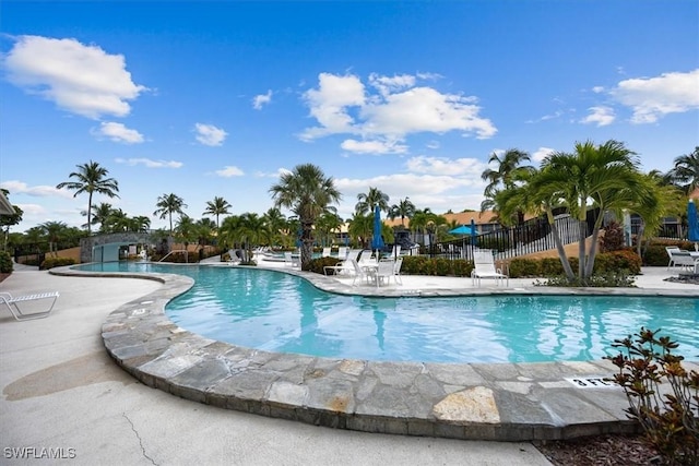 view of swimming pool featuring a patio area