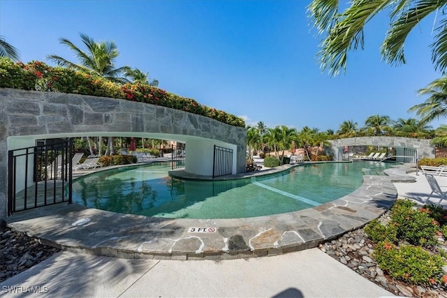 pool featuring a patio