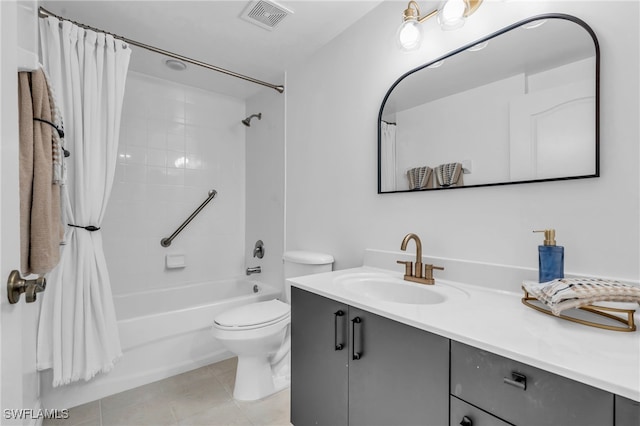 full bathroom with shower / bath combination with curtain, vanity, toilet, and tile patterned floors