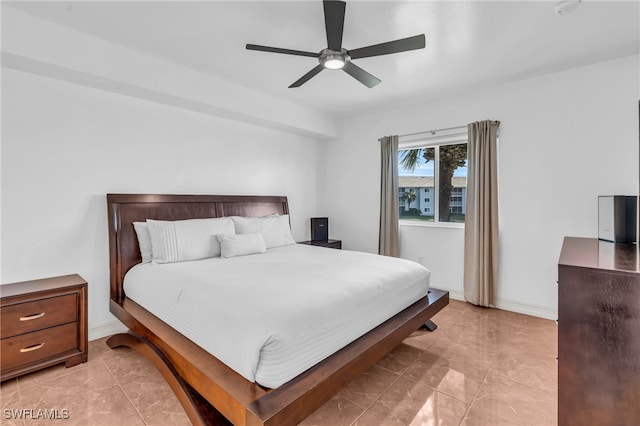 bedroom featuring ceiling fan