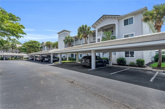 view of parking with a carport