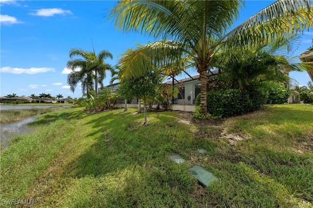 view of yard featuring a water view