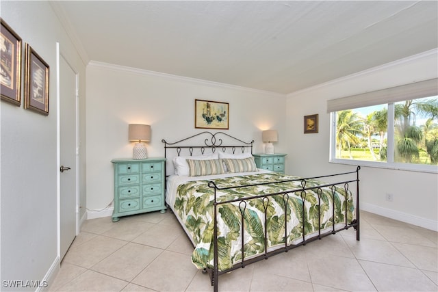 bedroom with light tile patterned floors and ornamental molding