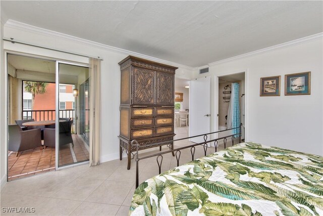 bedroom with light tile patterned floors, crown molding, and access to outside