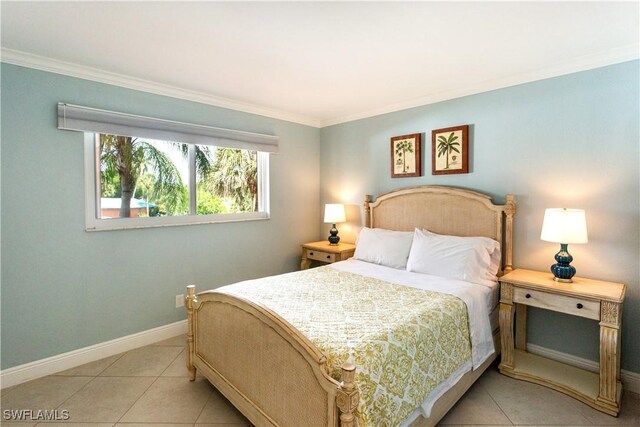 bedroom featuring light tile patterned floors and crown molding