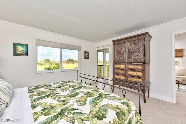 tiled bedroom with a textured ceiling, multiple windows, and crown molding