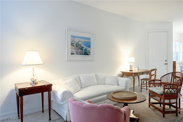 living room with light tile patterned floors