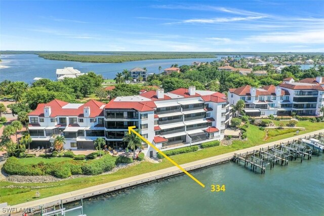 bird's eye view with a water view