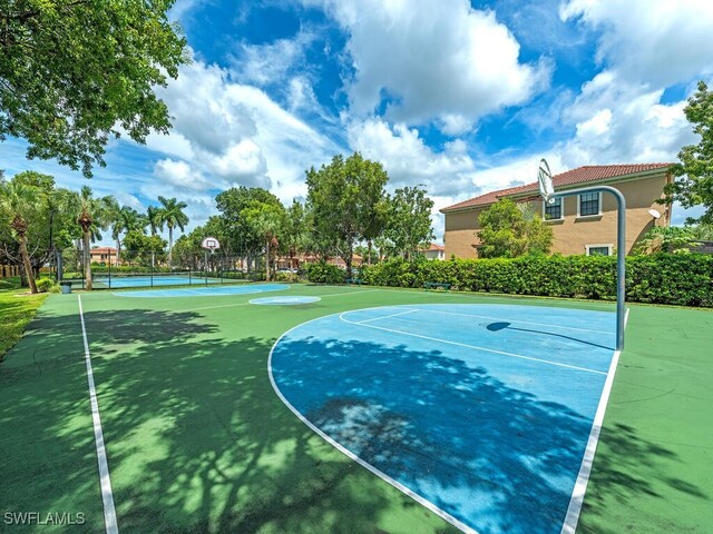 view of basketball court with tennis court