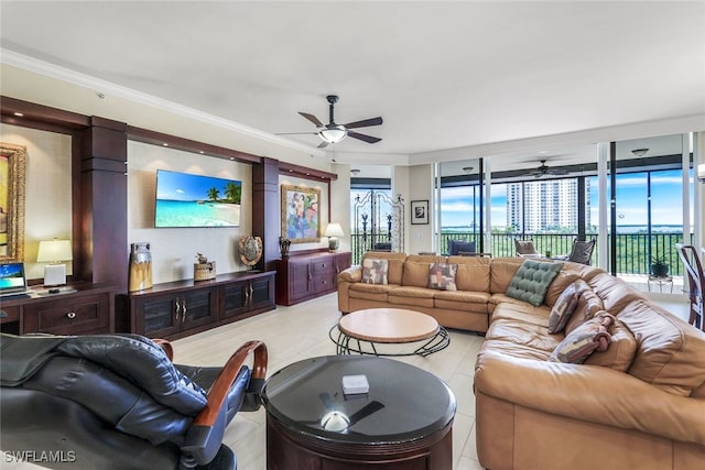 living room featuring crown molding and ceiling fan