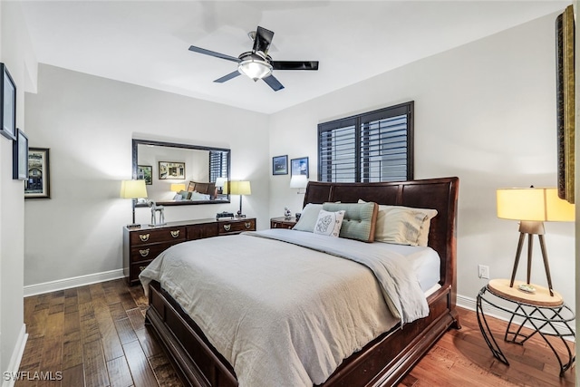 bedroom with wood-type flooring and ceiling fan