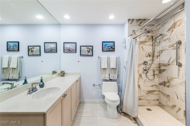 bathroom with vanity, toilet, and walk in shower