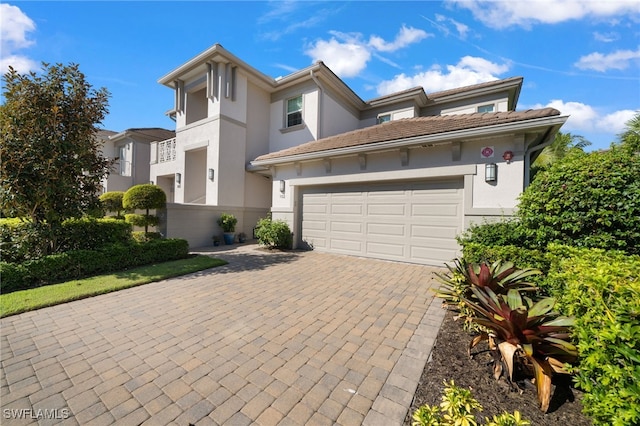 view of front of property with a garage