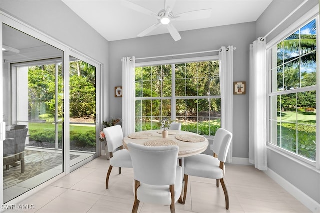 sunroom with ceiling fan and a wealth of natural light