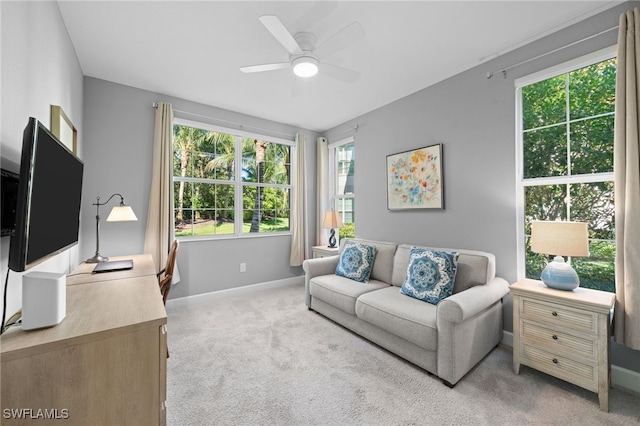 interior space with ceiling fan and a wealth of natural light