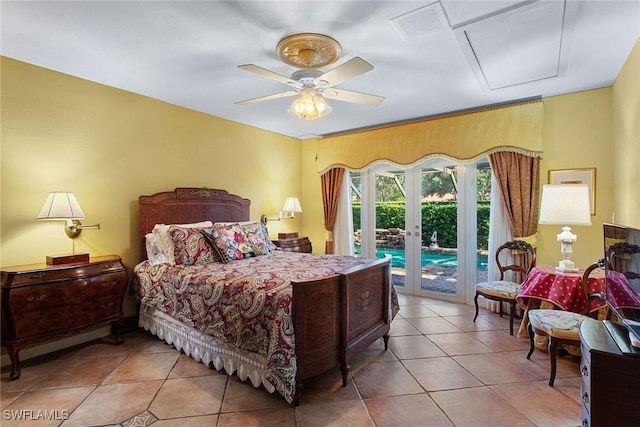 bedroom featuring attic access, french doors, access to outside, visible vents, and ceiling fan