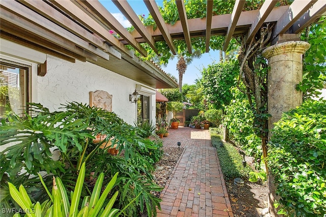 exterior space featuring a pergola and a patio