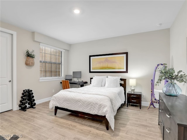 bedroom with light hardwood / wood-style flooring