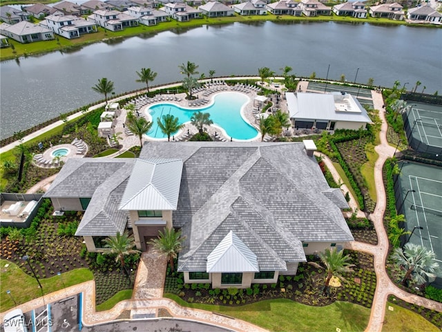 bird's eye view with a water view