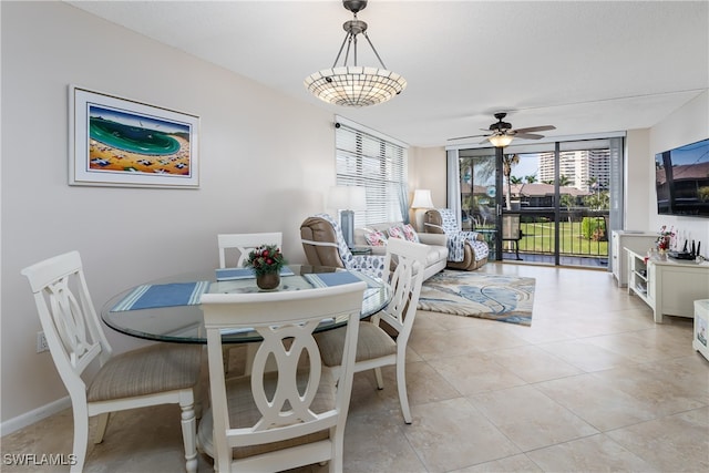 tiled dining room with ceiling fan