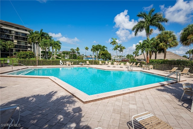 view of swimming pool with a patio area