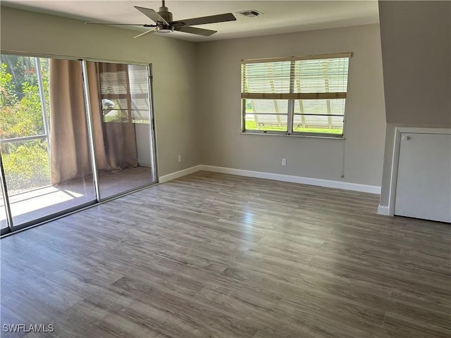 spare room featuring ceiling fan and wood-type flooring