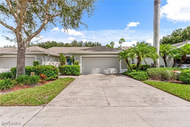 single story home with a garage