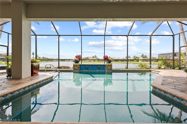 view of pool featuring a lanai and a patio area