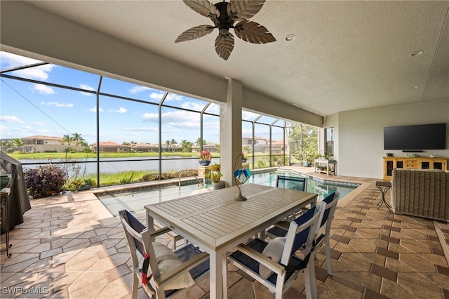 view of patio / terrace featuring glass enclosure and ceiling fan