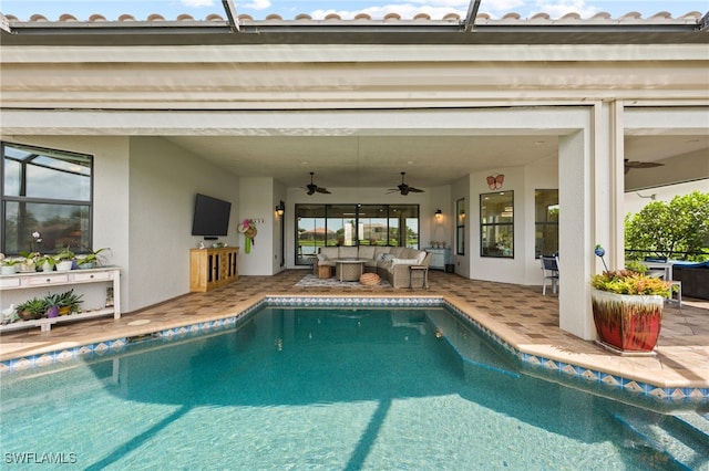 view of pool featuring ceiling fan, outdoor lounge area, and a patio area