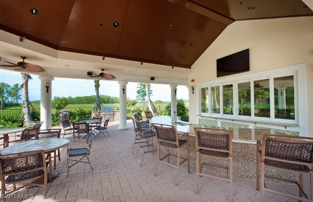 view of patio featuring ceiling fan