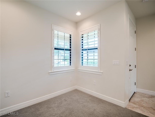 view of carpeted spare room