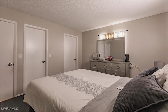 bedroom with a textured ceiling