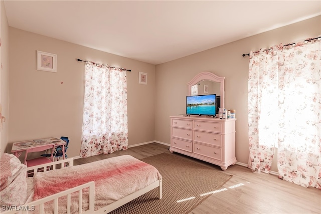 bedroom featuring light hardwood / wood-style flooring