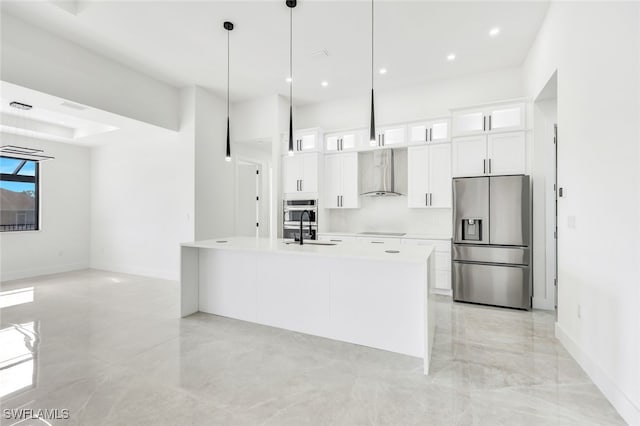 kitchen with stainless steel fridge with ice dispenser, light countertops, glass insert cabinets, white cabinetry, and wall chimney exhaust hood