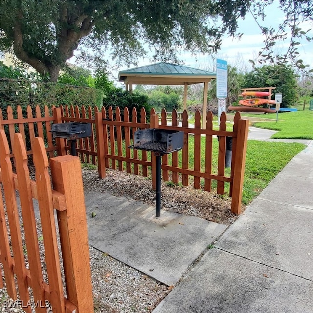 exterior space with a gazebo and a yard