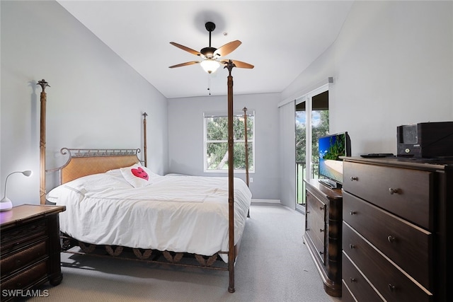 bedroom featuring light carpet, vaulted ceiling, and ceiling fan