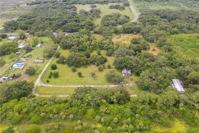 birds eye view of property featuring a rural view