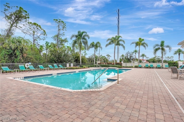 view of swimming pool featuring a patio