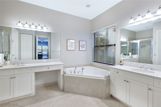 bathroom with vanity, independent shower and bath, and tile patterned flooring