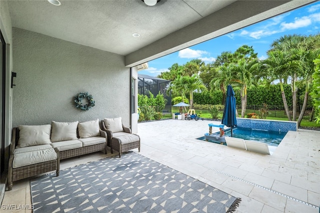 view of patio / terrace featuring a lanai