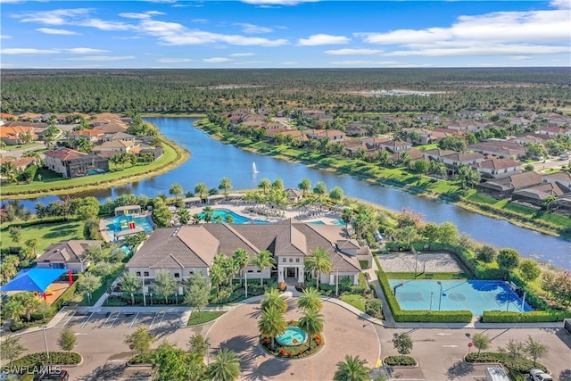 birds eye view of property featuring a water view