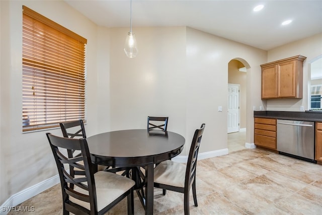 dining room with a healthy amount of sunlight