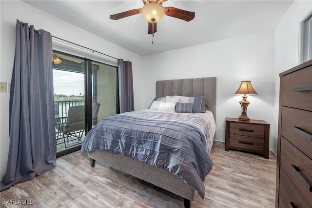 bedroom featuring access to outside, light hardwood / wood-style flooring, and ceiling fan