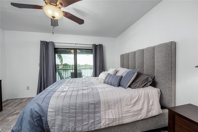 bedroom featuring ceiling fan, access to exterior, and wood-type flooring