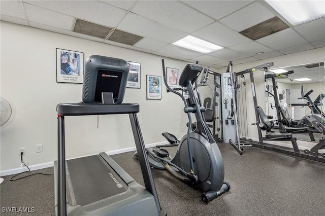 exercise room with a drop ceiling