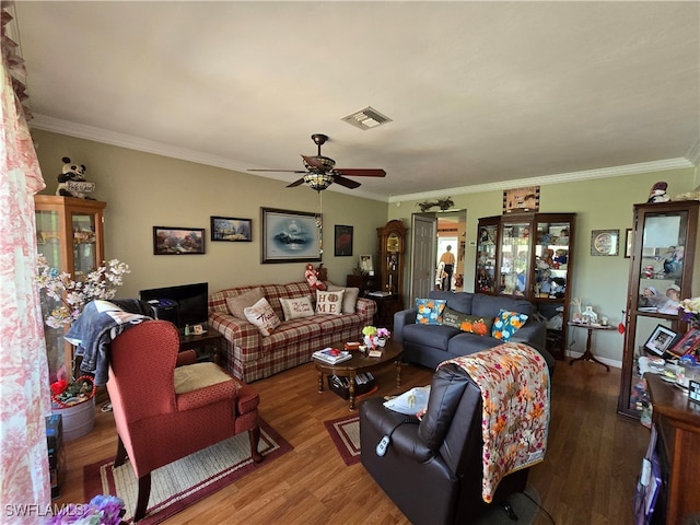 living room featuring ceiling fan, crown molding, and hardwood / wood-style floors